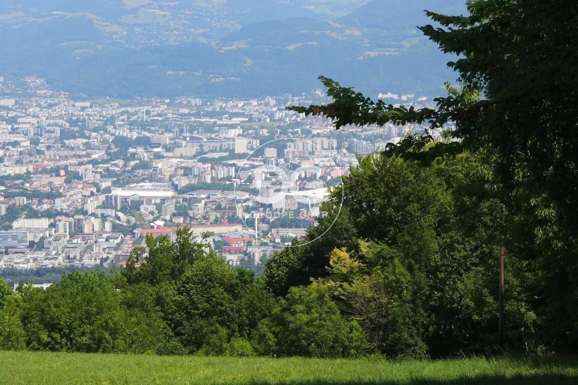 da779eb81b6be3c0217dd6467120a9aa TERRAIN DE HUIT HECTARES ET DEMI A QUINZE MINUTES DU CENTRE VILLE DE GRENOBLE